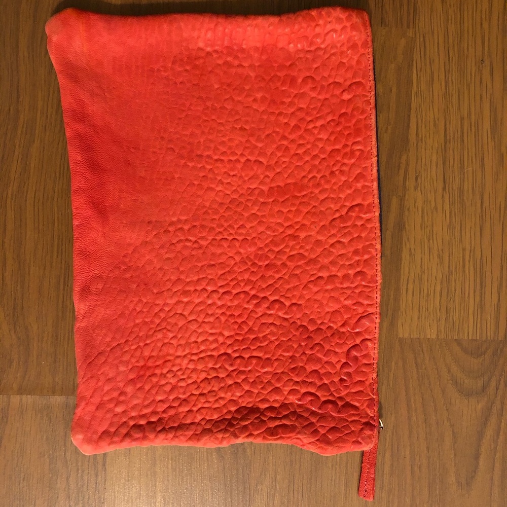 Coral leather clutch